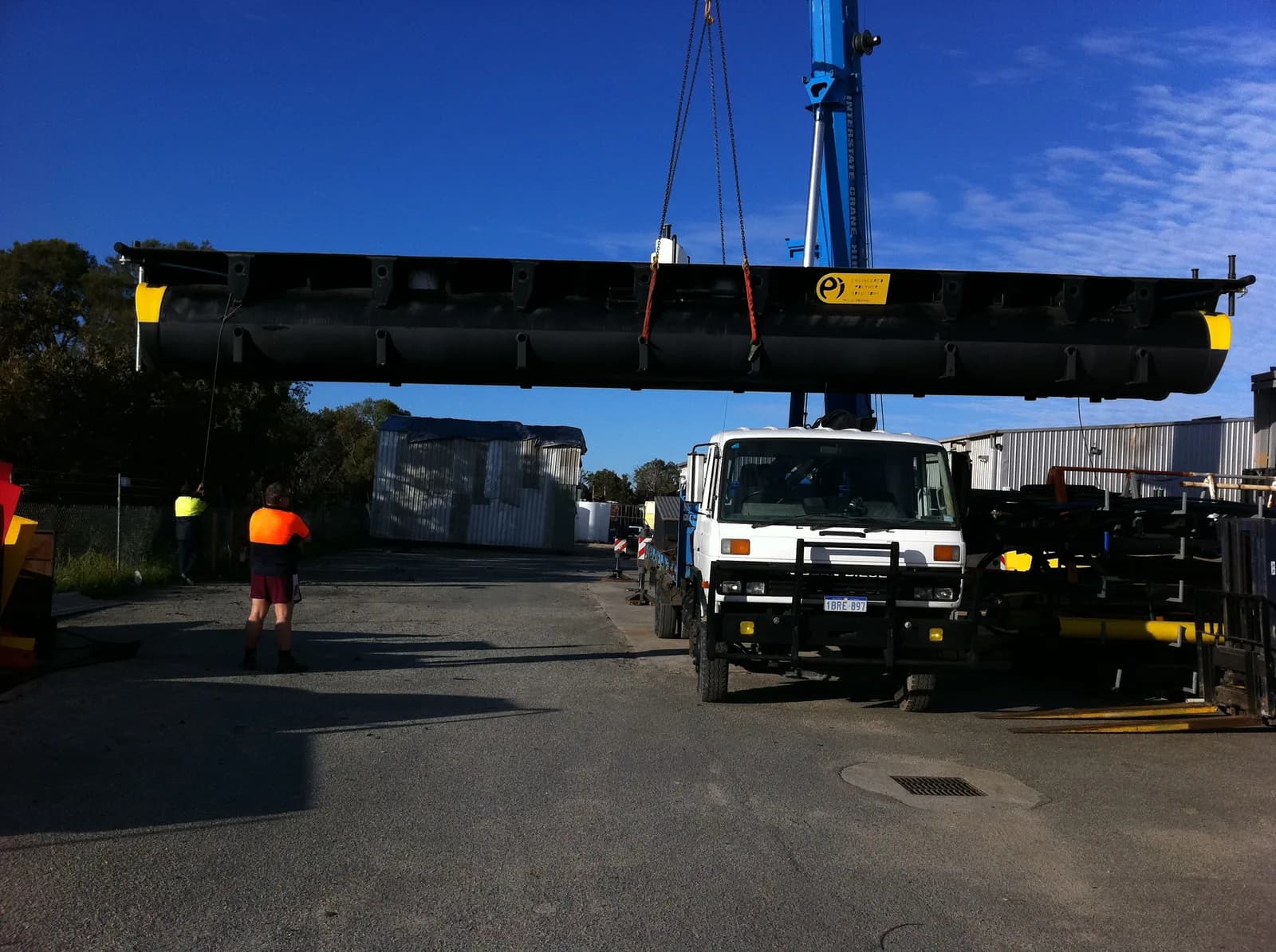 21 m HDPE barge on flatbed truck for site delivery — view 1