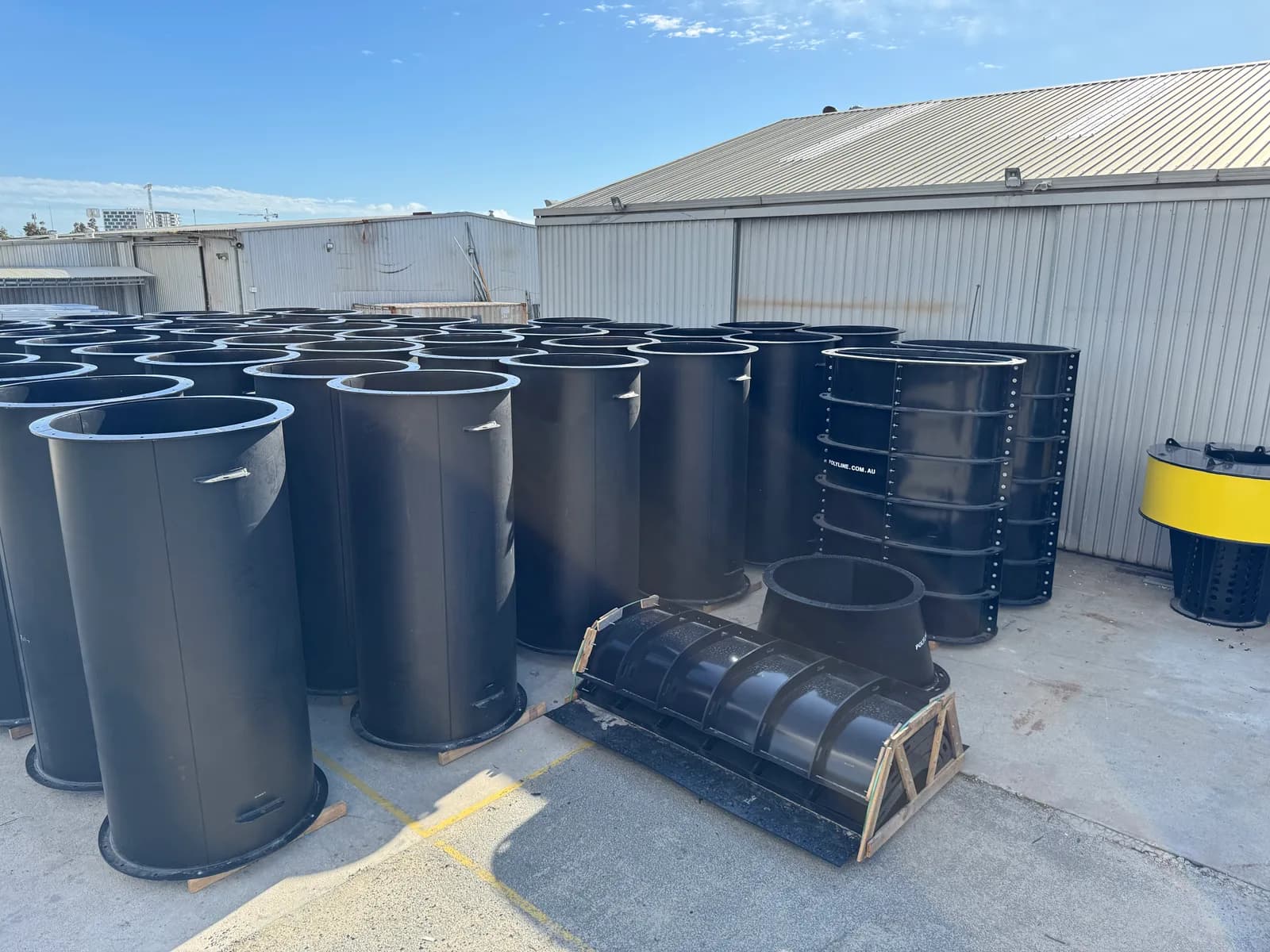 Fabricated HDPE ducting, cones and a crated segmented section in the yard