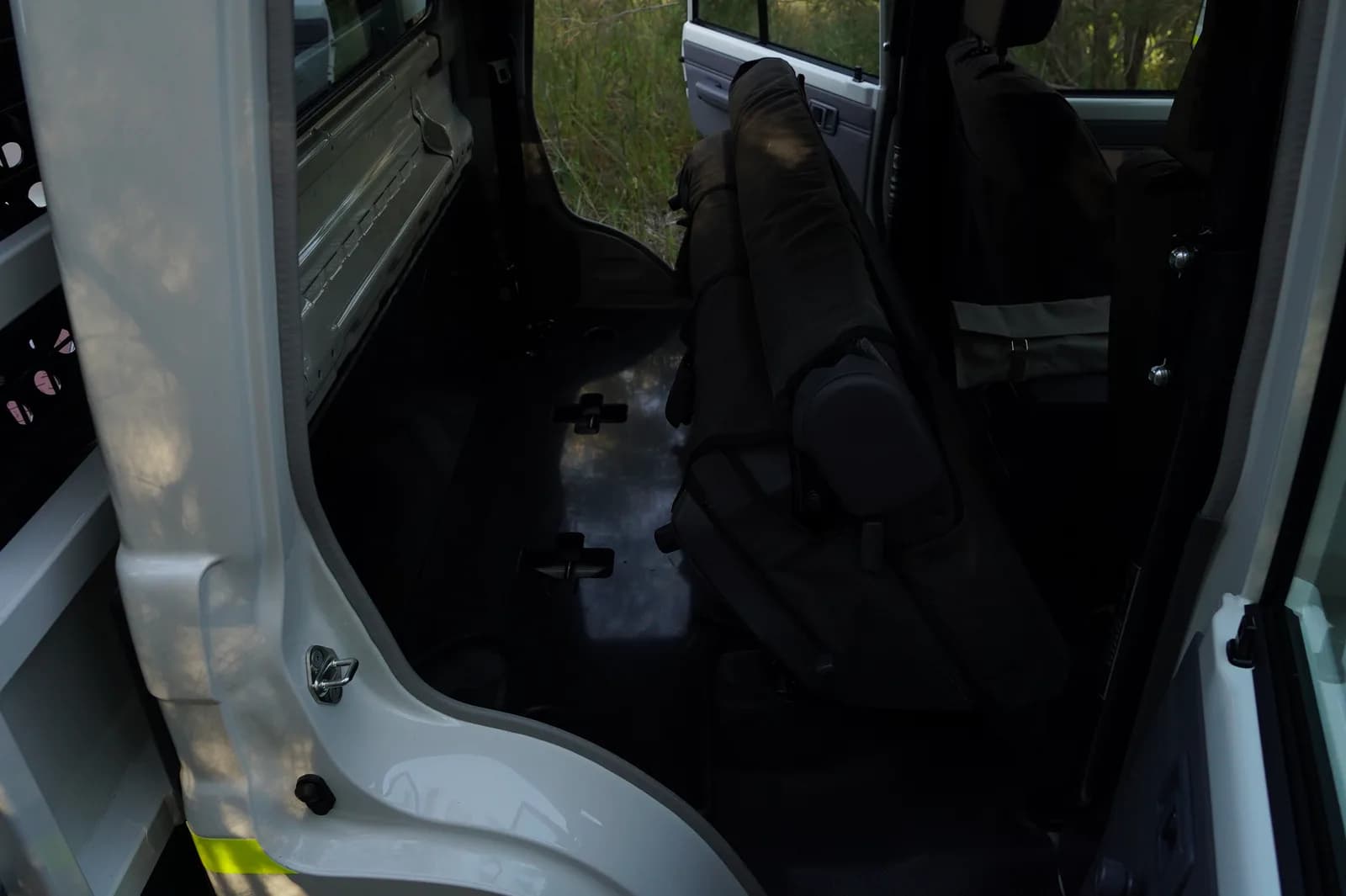 HDPE under-seat protector — install view 1